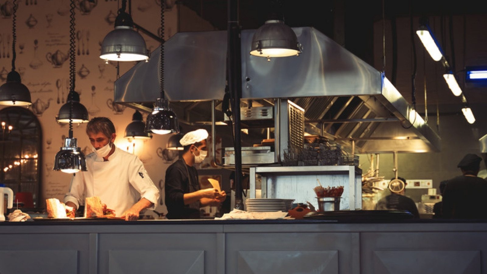 A busy commercial restaurant kitchen